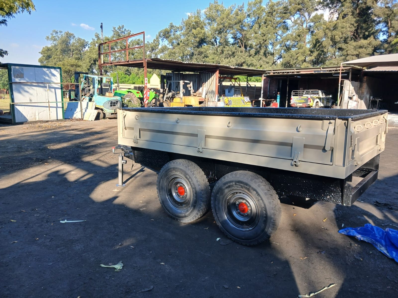Dropside trailer standing in the yard