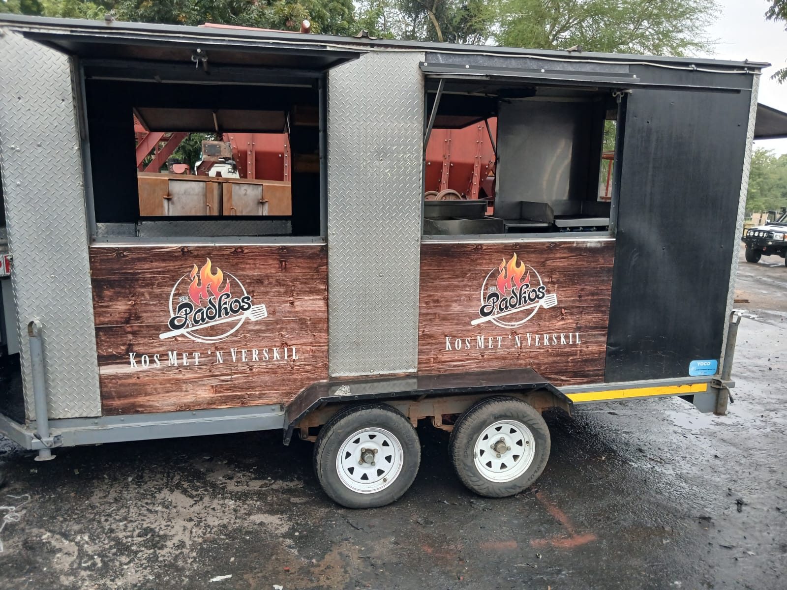 Catering trailer with a black rubberised floor